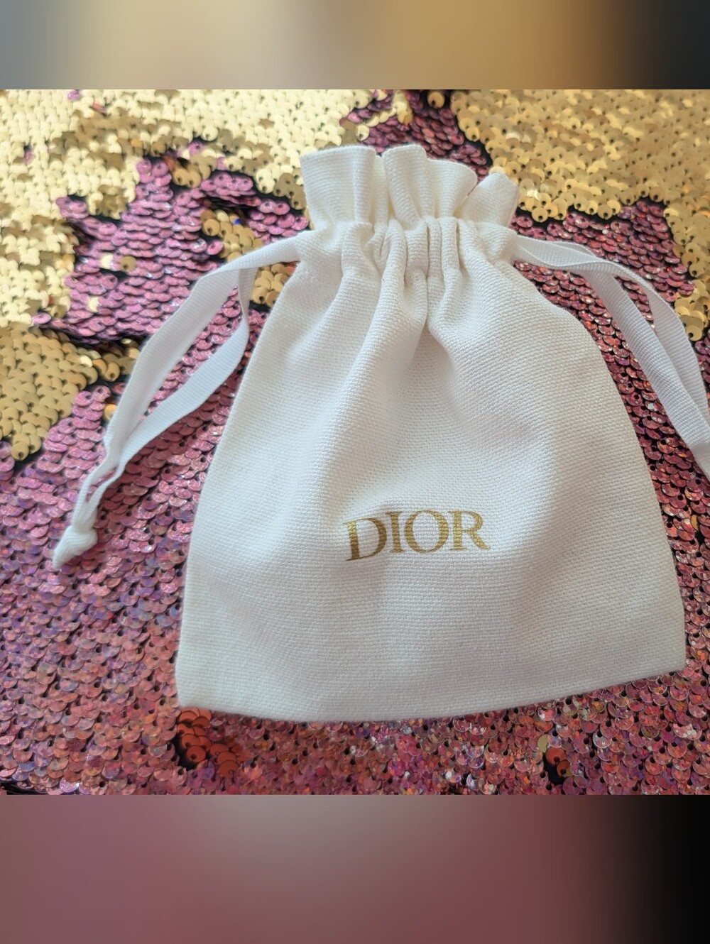 White Drawstring with Gold DIOR Logo